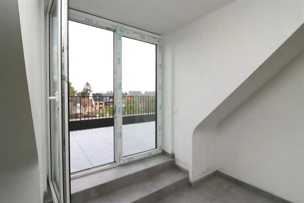 Uniek penthouse in centrum Aarschot met 1 slpk. parking en terras foto 12