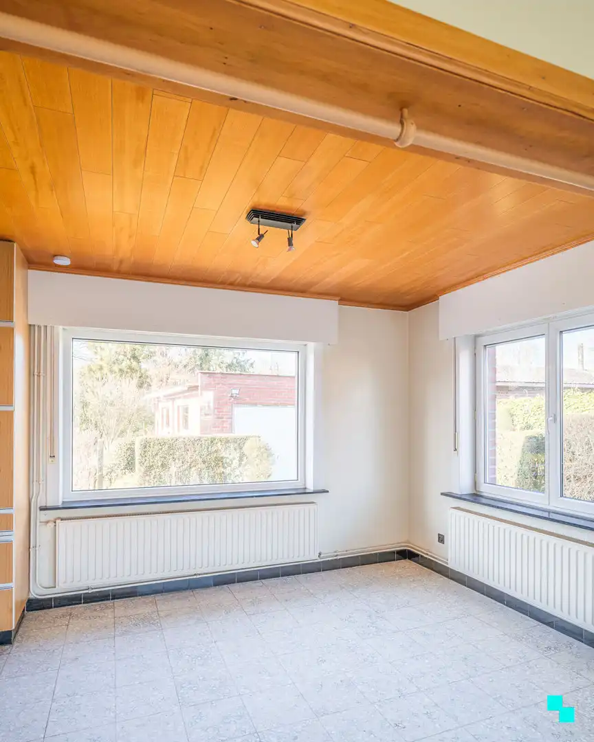 Te renoveren woning met garage en unieke tuingrond grenzend aan het bos foto 6