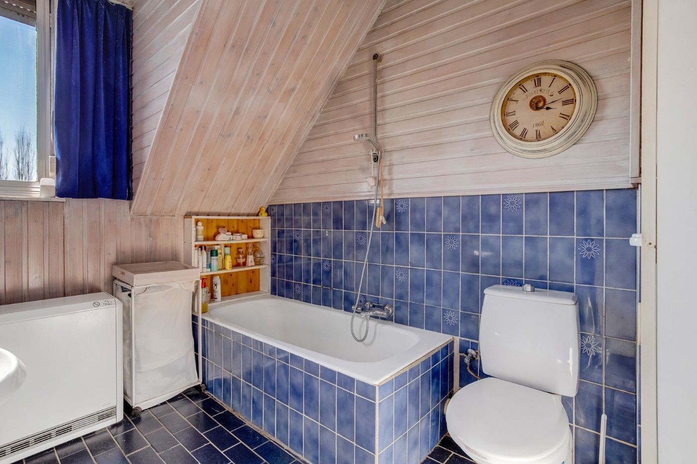 Centraal gelegen, op te frissen woning met 2 à 3 slpk., inpandige garage en tuin foto 13