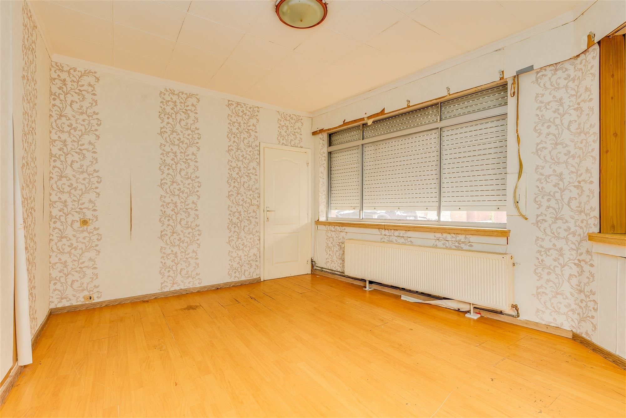 Te renoveren woning 2 slpk met garage foto 6