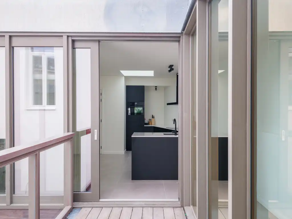 Luxueus appartement met groot volume en terras op toplocatie aan de Sint-Michielskerk foto 12