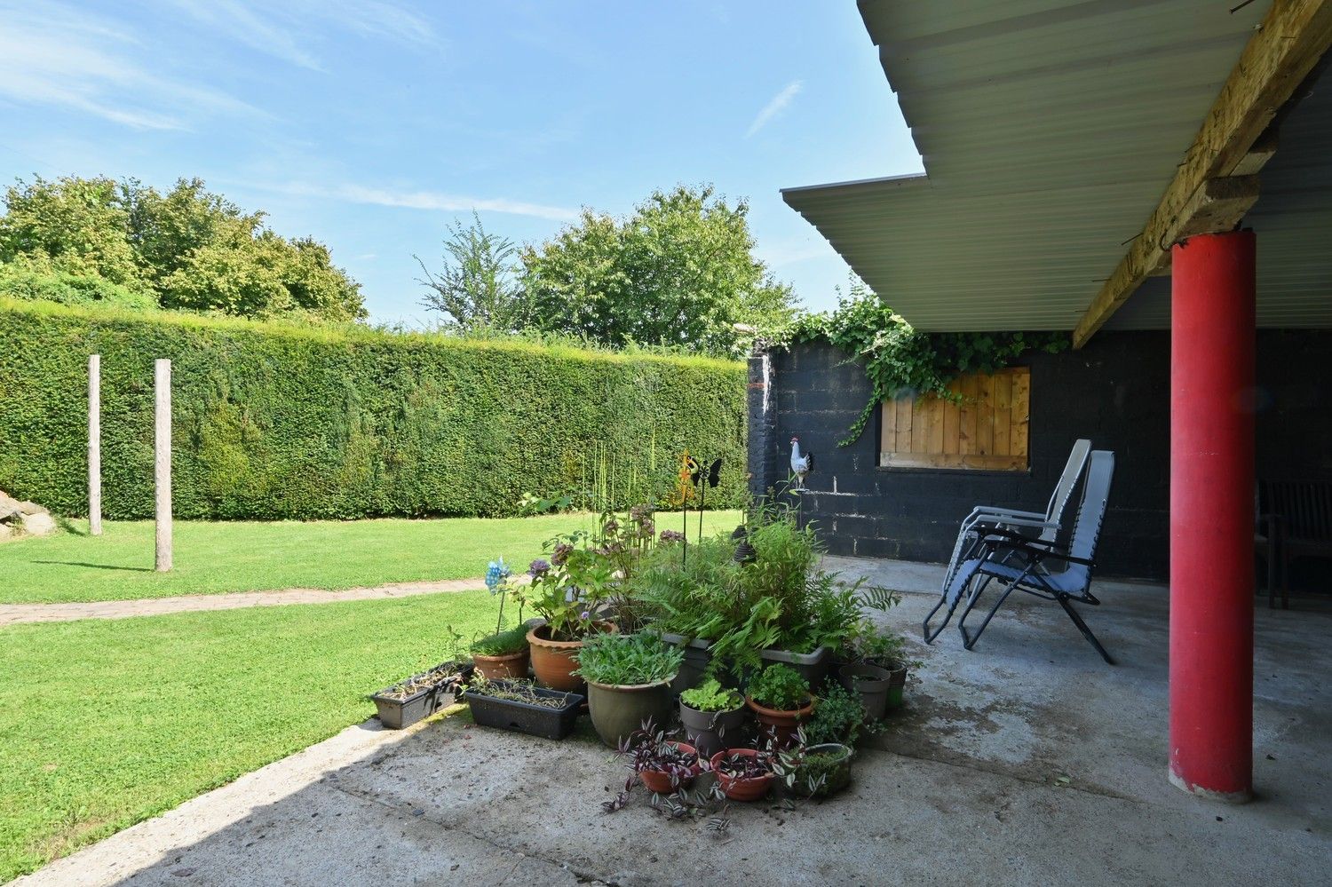 Charmante, gemoderniseerde woning met garage, carport en grote tuin, rustig gelegen te Lanaken foto 19