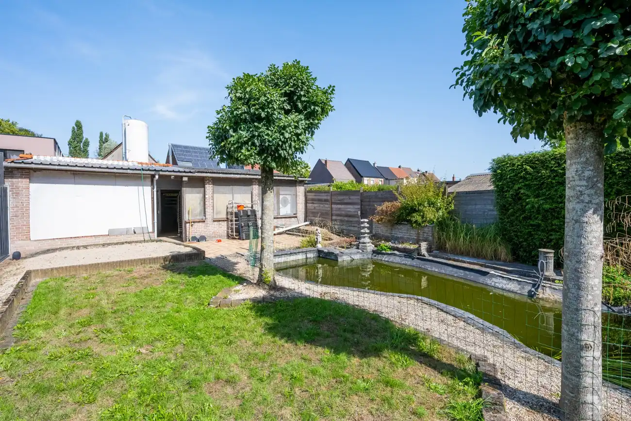 Strategisch gelegen handelspand met winkelruimte (bakkerij) met inpandige garage, grote werkruimte (ca. 145m²) en aangename tuin met open zicht in Ertvelde! foto 25