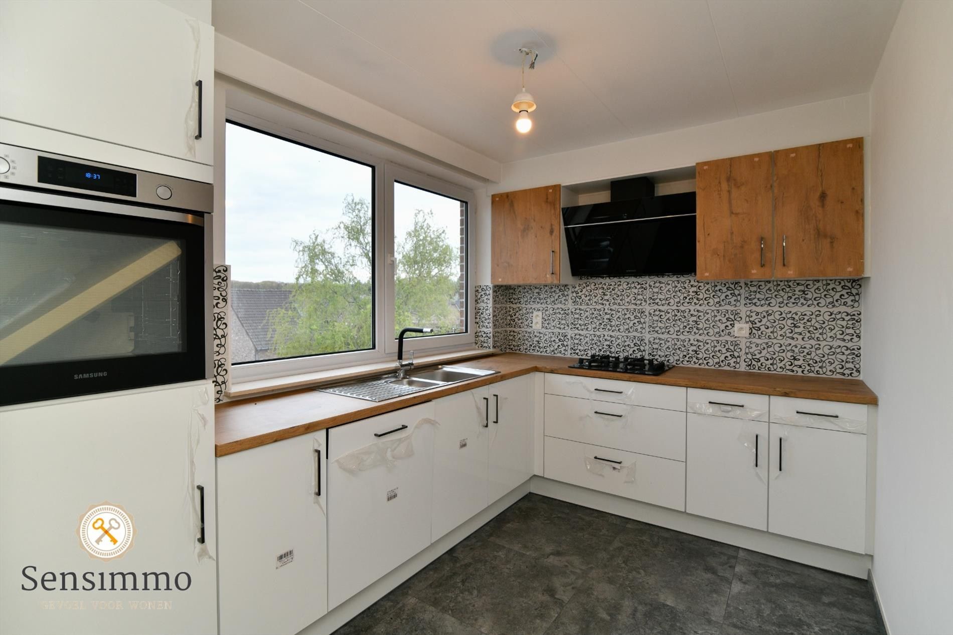 Prachtig gelegen modern 2slpk-appartement met garagebox foto 4