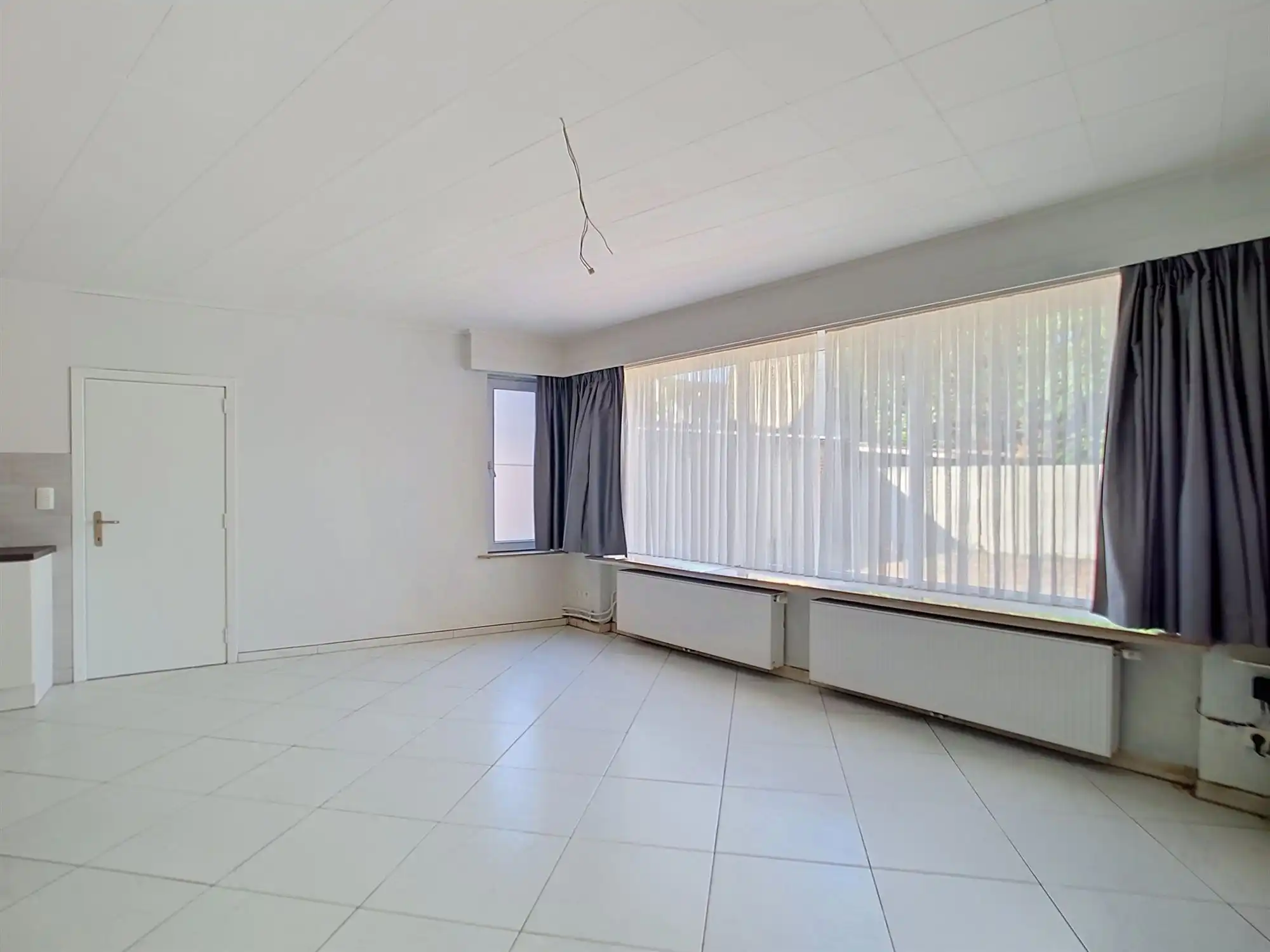 Gelijkvloers appartement met 2 slaapkamers, polyvalente ruimte en garage foto 5
