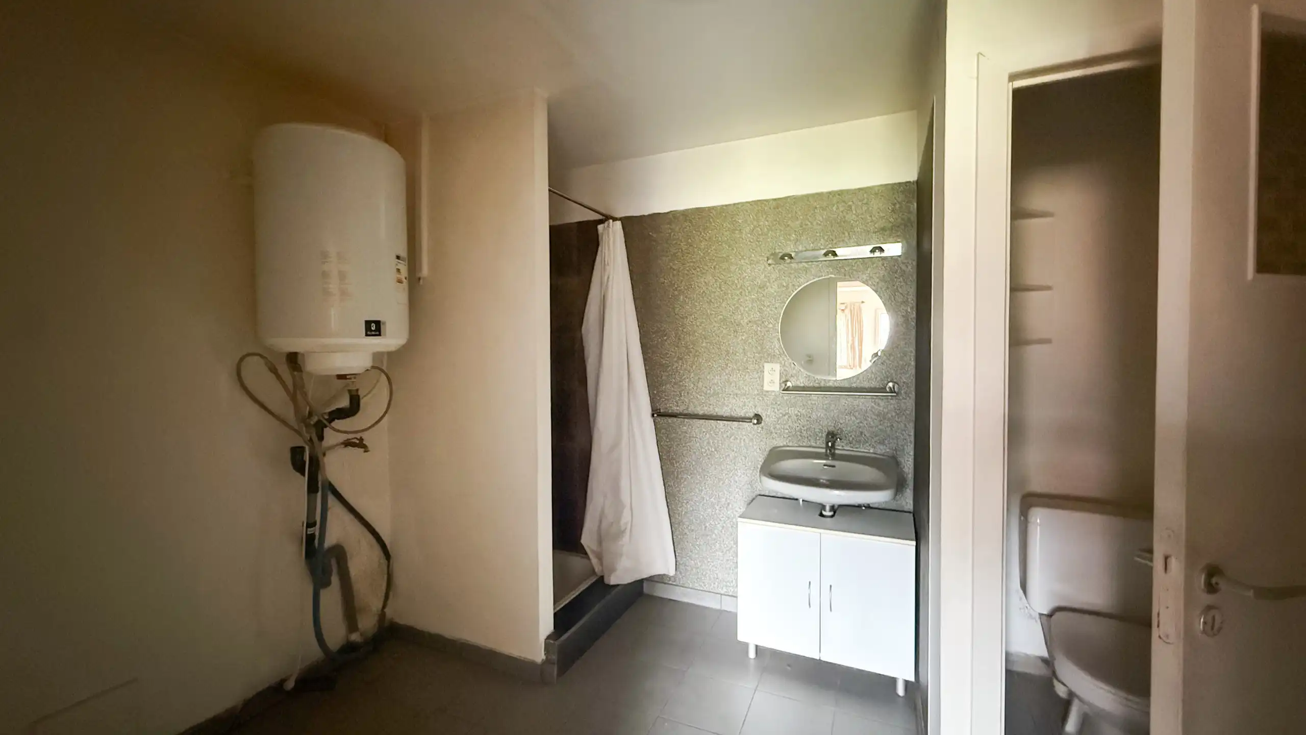 Renovatiepand met ruime living en mooi perceel van 6+ are! foto 9