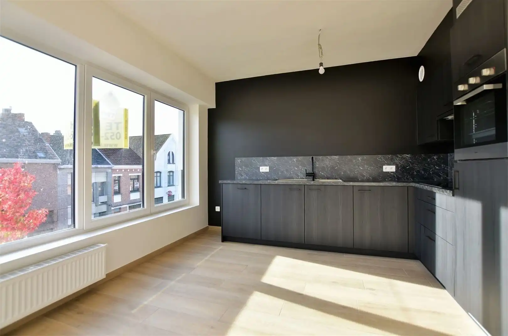 Prachtig dakappartement met terras, gelegen in het hartje van Sint-Gillis-Dendermonde. foto 7