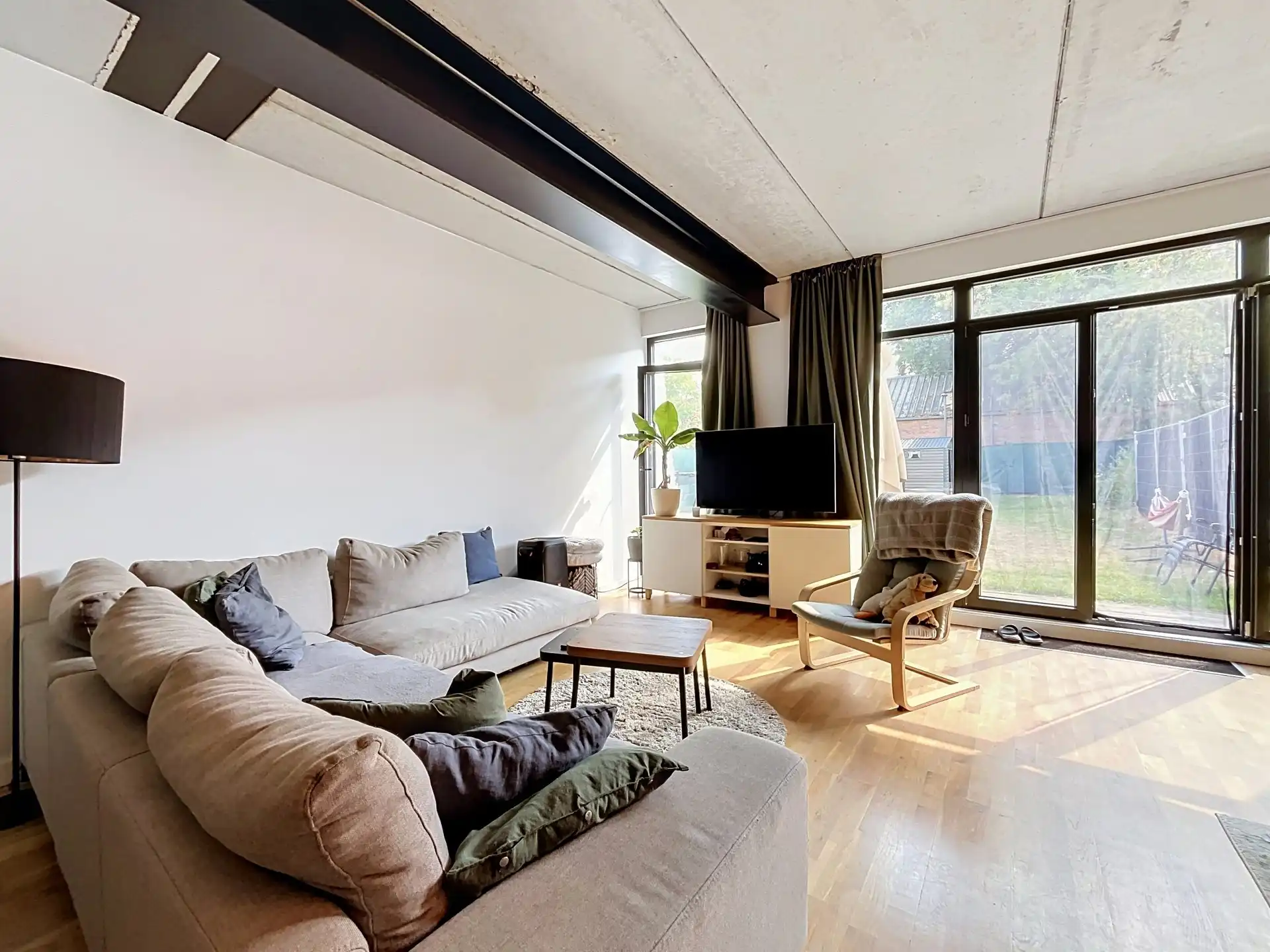 Modern gelijkvloers appartement met tuin van 200m²! foto 3
