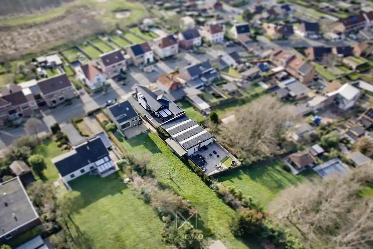Gelijkvloerse bungalow met loods van 180 m² in het centrum van Marke foto 29