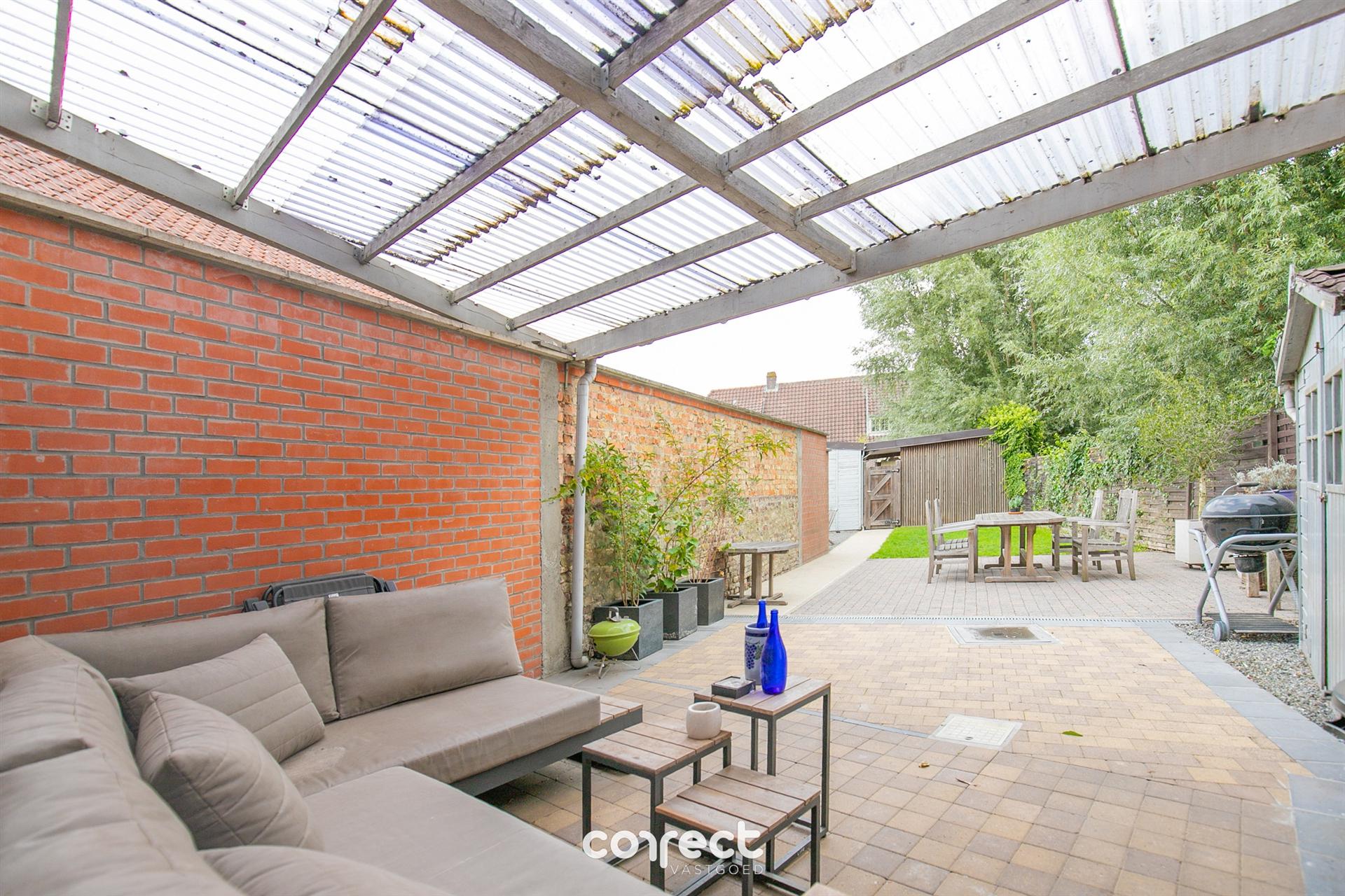 Instapklare woning met 2 slaapkamers, zonnige tuin en garage.  foto 8