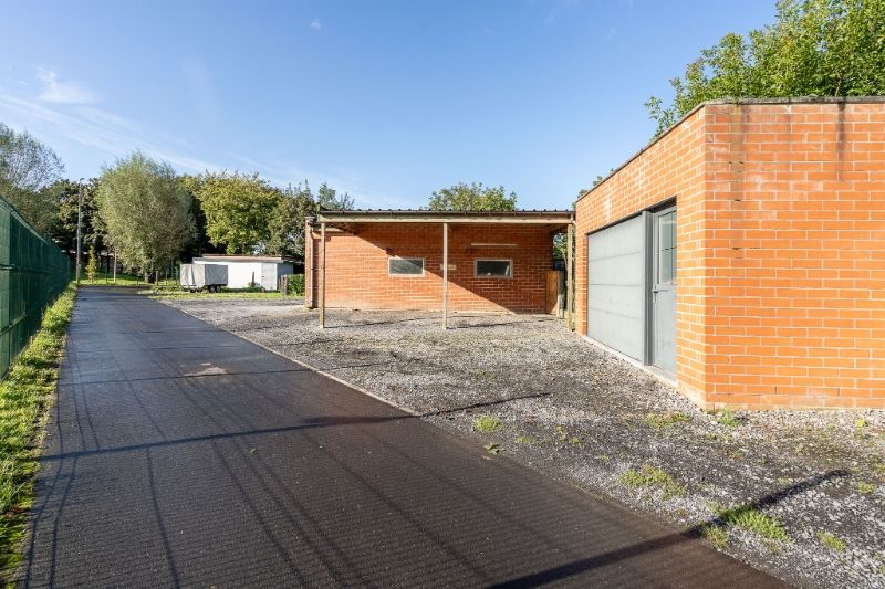 Instapklare woning met ruime keuken, tuin en garage op centrale locatie foto 35