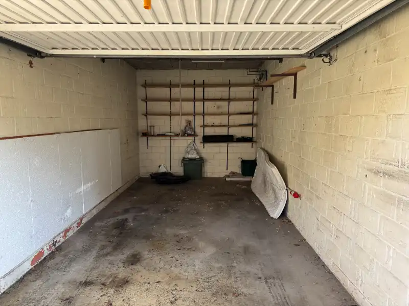 Gelijkvloers 2 slpk. appartement met tuin en garage foto 18