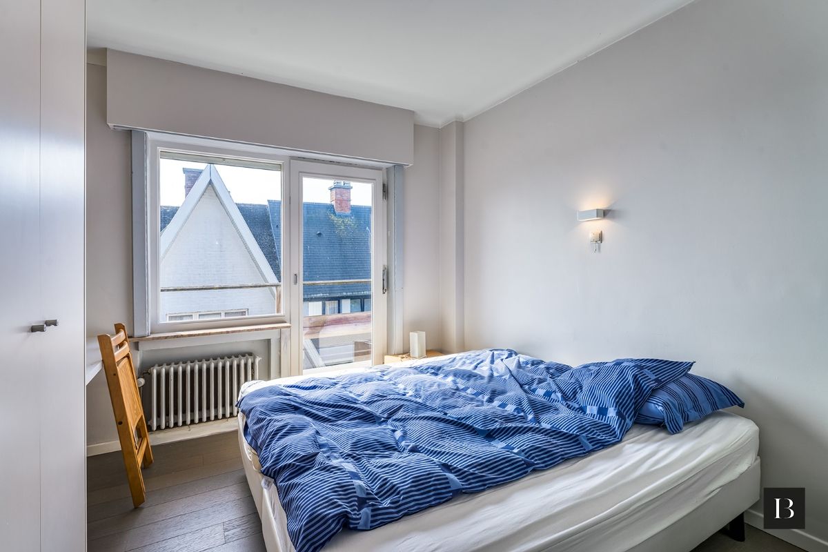 Ruim (123m²) appartement met garagebox en zolder in de Concessie foto 7