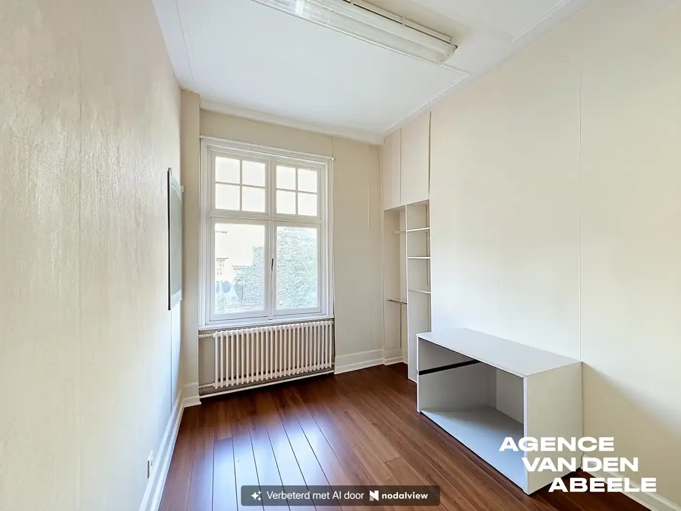 Centraal gelegen woning met 4 slaapkamers en riante tuin  foto 9