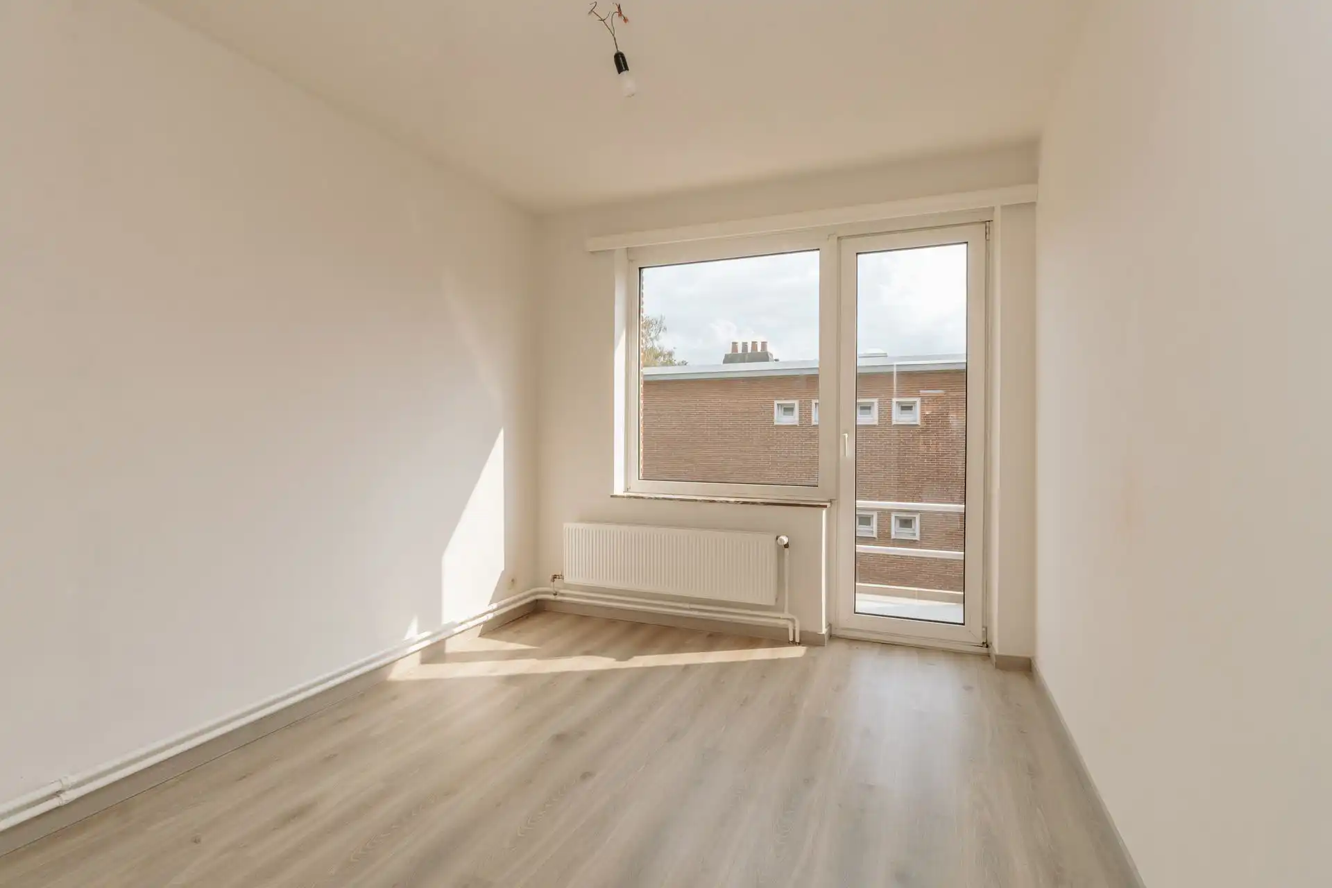 Lichtrijk 2 slaapkamerappartement op centrale ligging foto 9