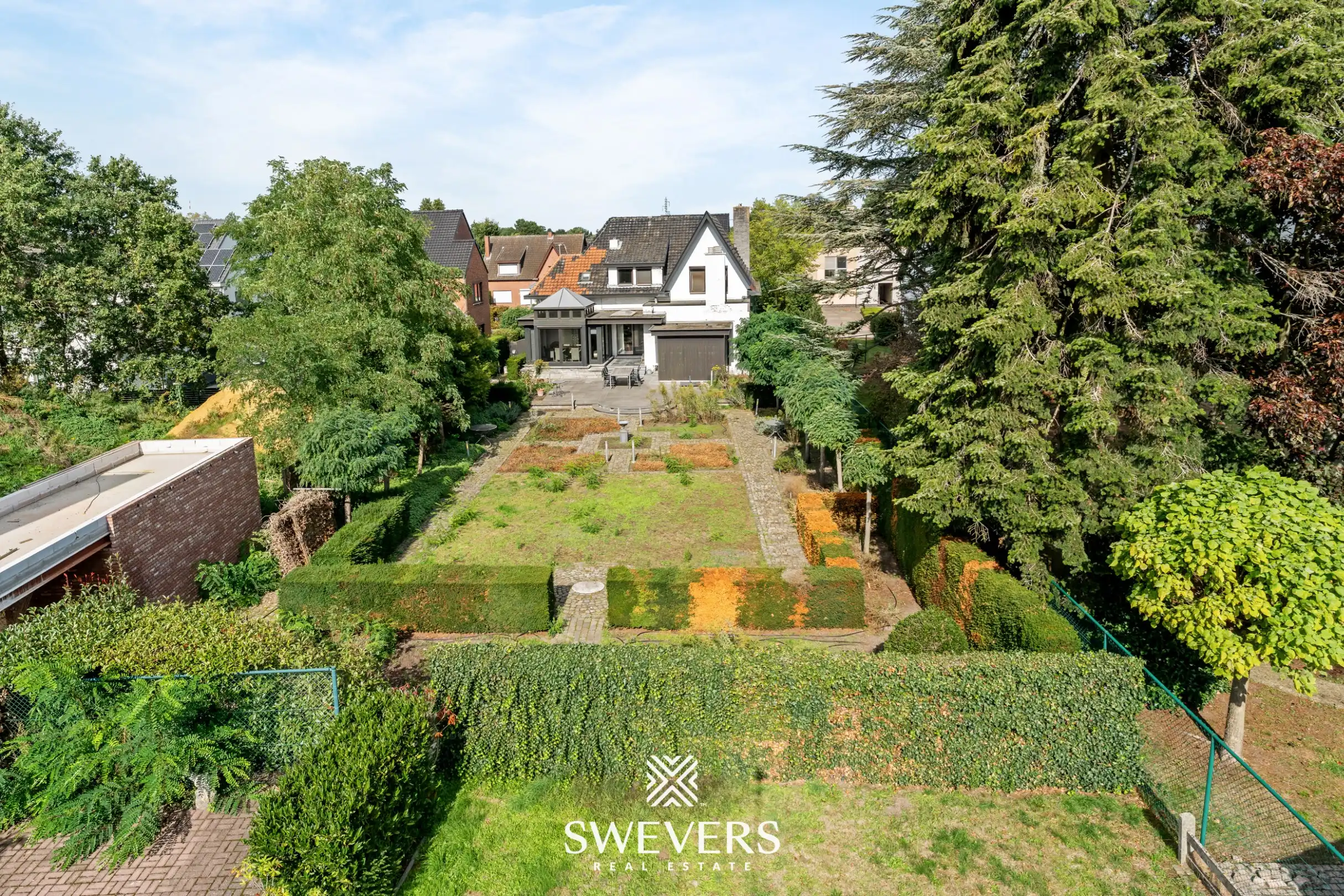 Knappe woning met orangerie, mogelijkheid tot 4 slpk en achterliggende bouwgrond foto 39