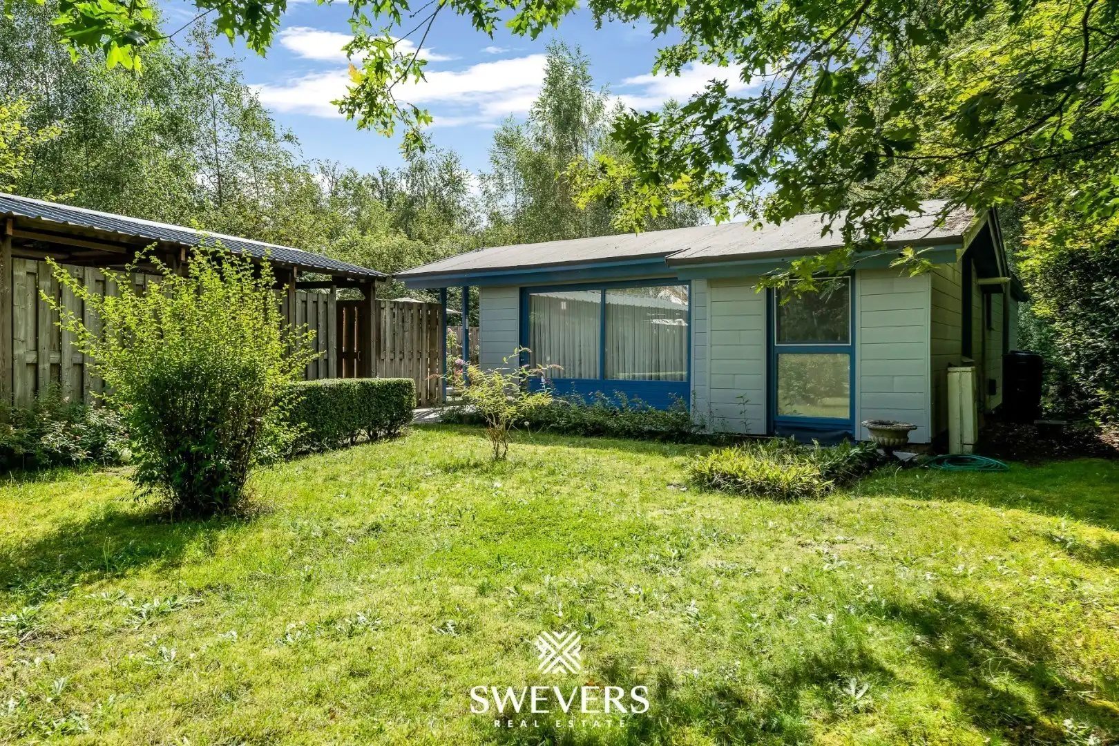 Idyllische vakantiewoning op groen perceel van 19a99ca in het gegeerde Bolderberg foto 3