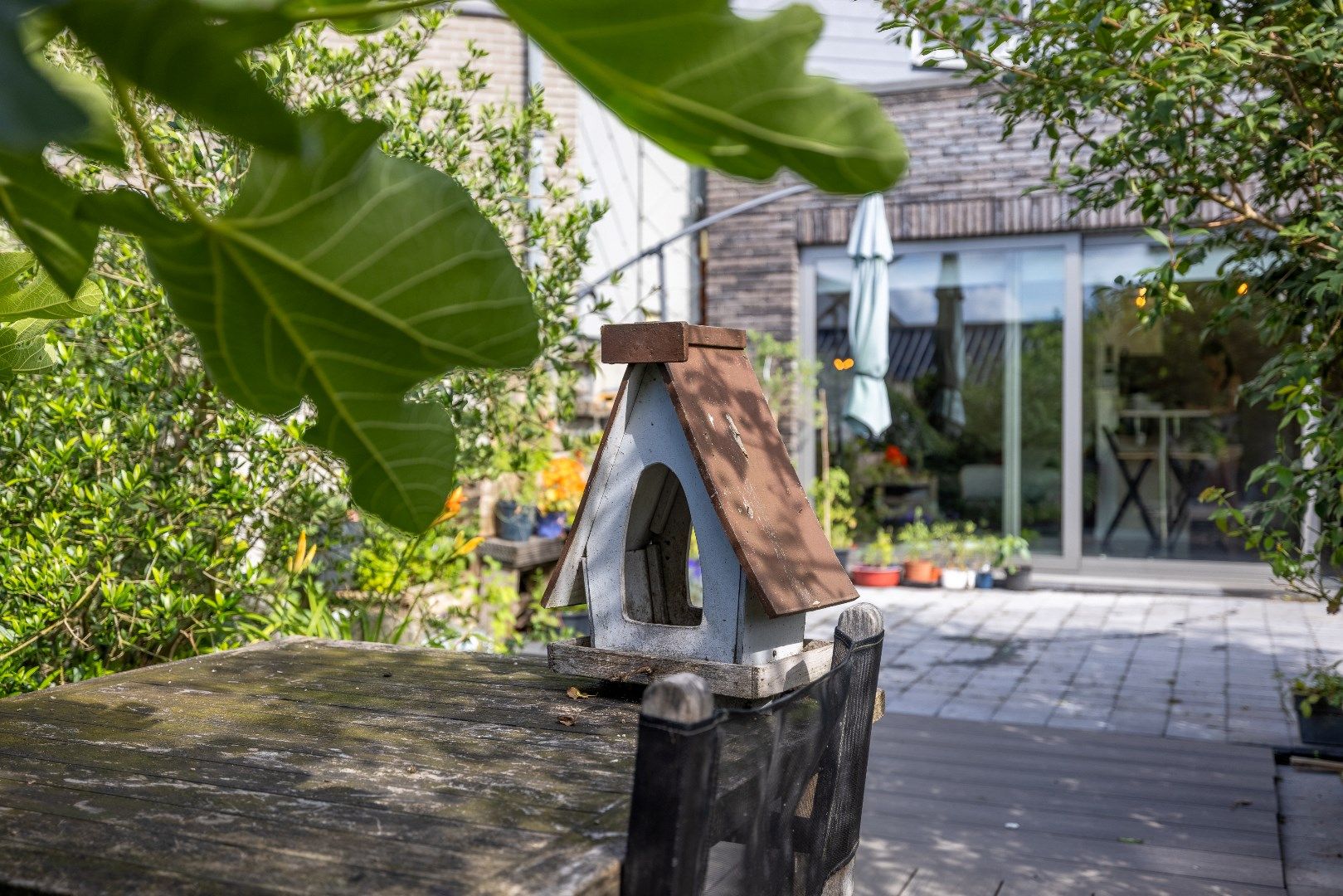 Uiterst gezellige woning met 3 slk, garage, terras en tuin foto 13