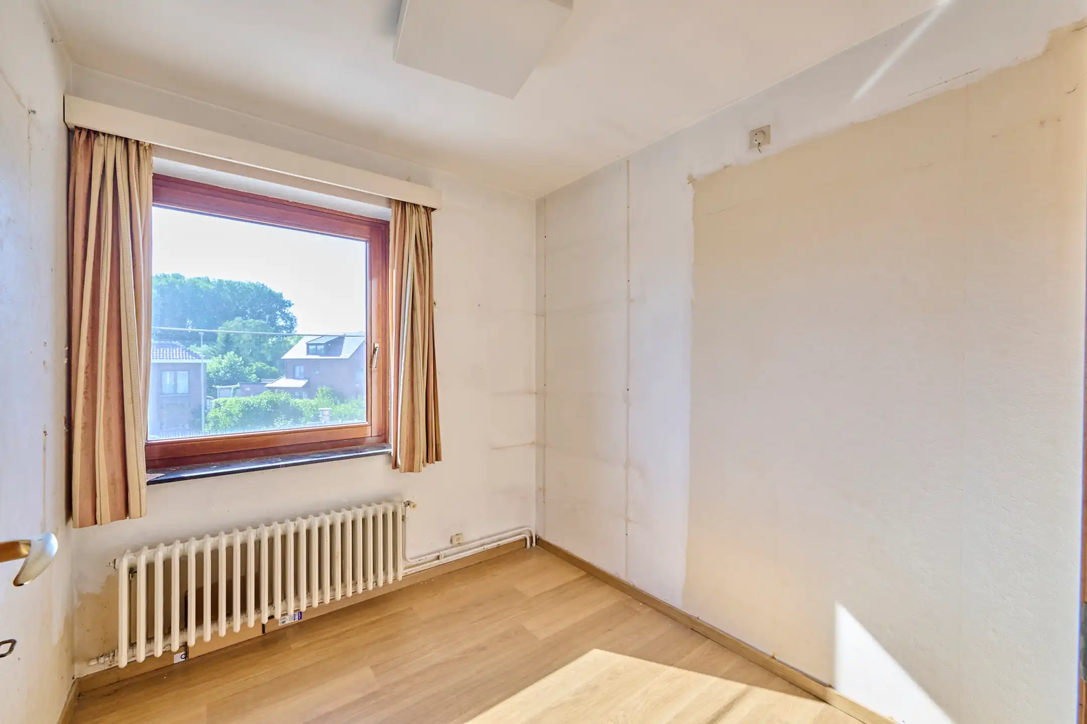 Goed onderhouden rijwoning op toplocatie met parking foto 11