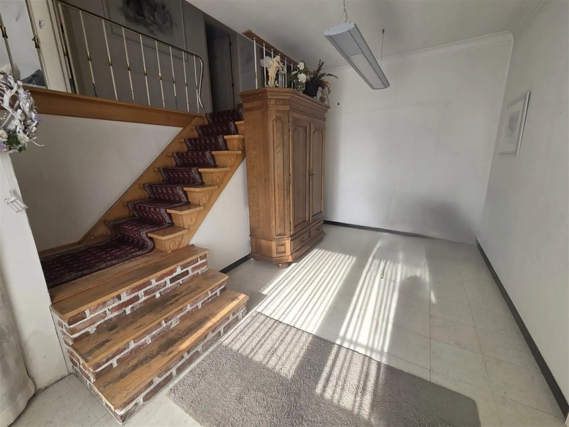 Woonhuis met aangebouwd werkatelier of polyvalante ruimte en garage aanbouwen foto 2