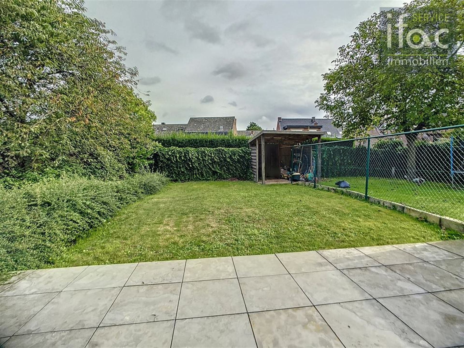 Mooie stapelwoning met tuin foto 2