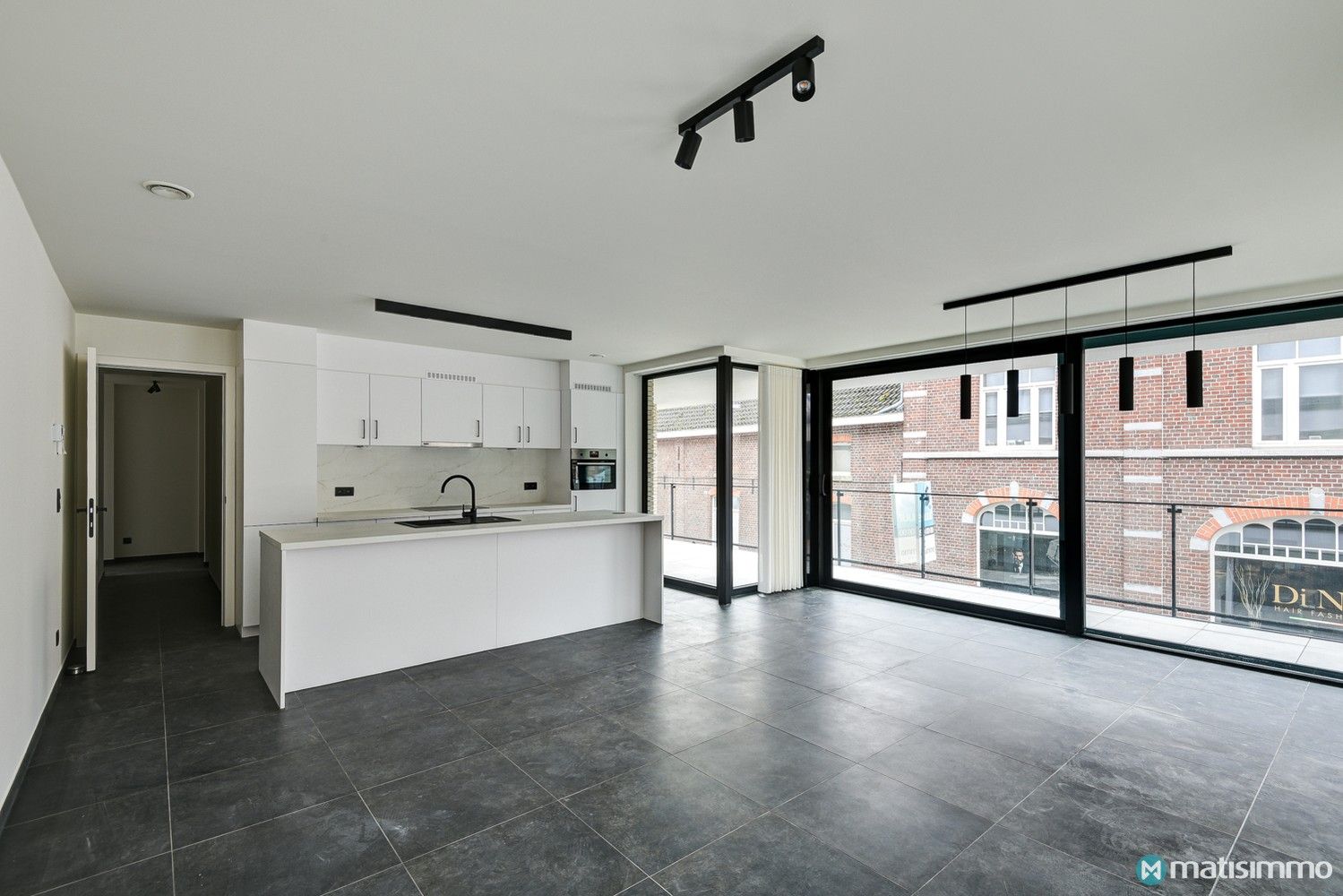 ENERGIEZUINIG APPARTEMENT MET 2 SLAAPKAMERS EN PARKEERPLAATS IN HET CENTRUM VAN BILZEN foto 2