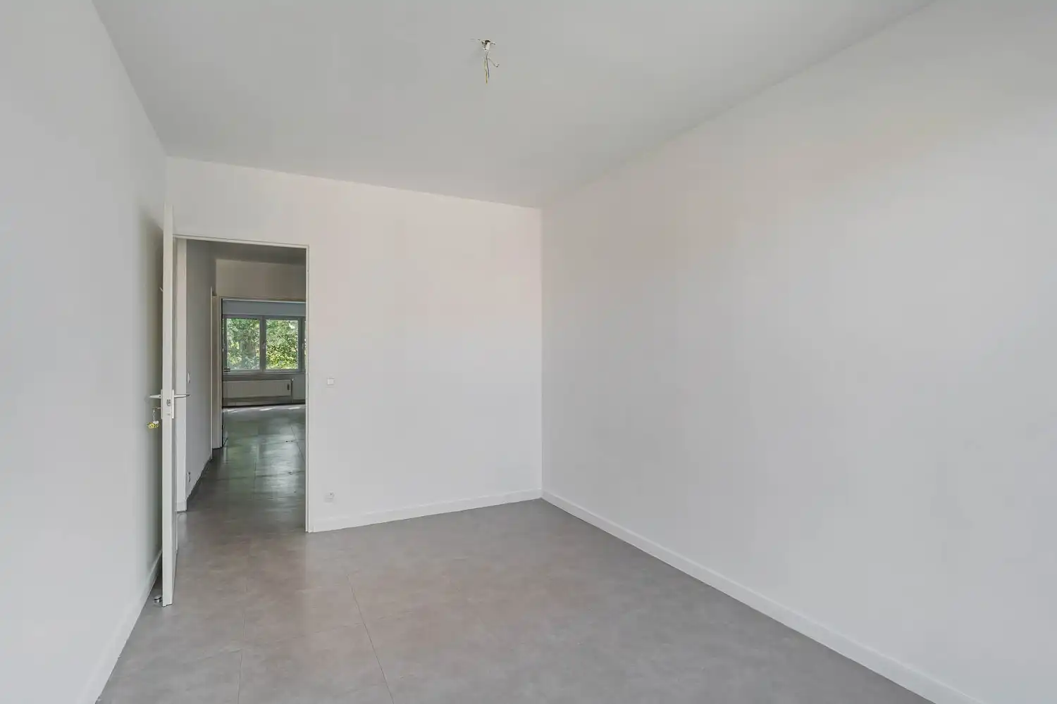 Goed gelegen, lichtrijk en energiezuinig appartement met 2 slaapkamers, een terras en een gemeenschappelijke tuin tegenover de botanische tuin en nabij het UZ Gasthuisberg te centrum Leuven! foto 19