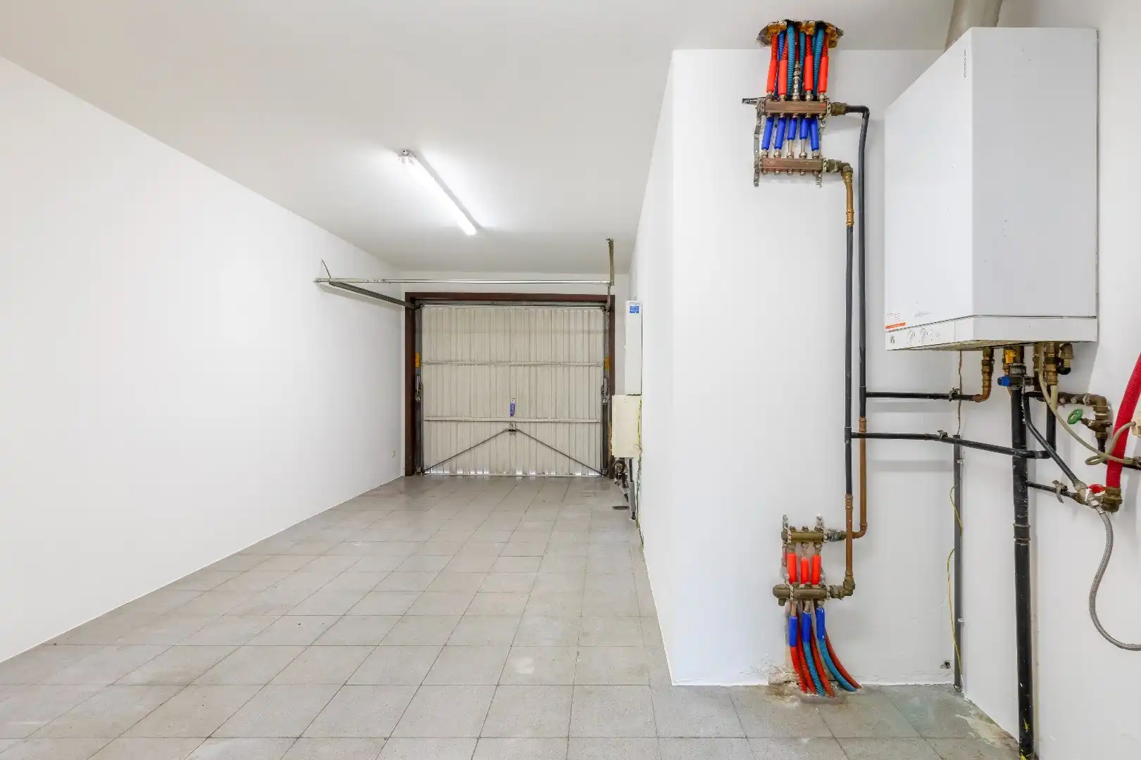 Gunstig gelegen instapklare woning in rij met garage en toffe tuin foto 11