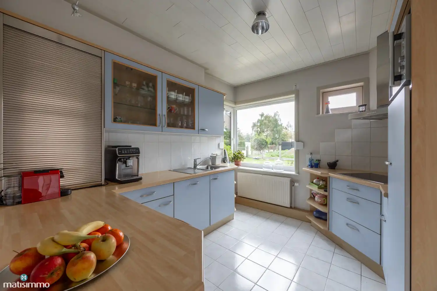 INSTAPKLAAR GERENOVEERDE WONING MET 3 SLAAPKAMERS, GARAGE, CARPORT EN PRACHTIGE TUIN NABIJ HET KANAAL EN DE MAAS IN LANAKEN foto 10