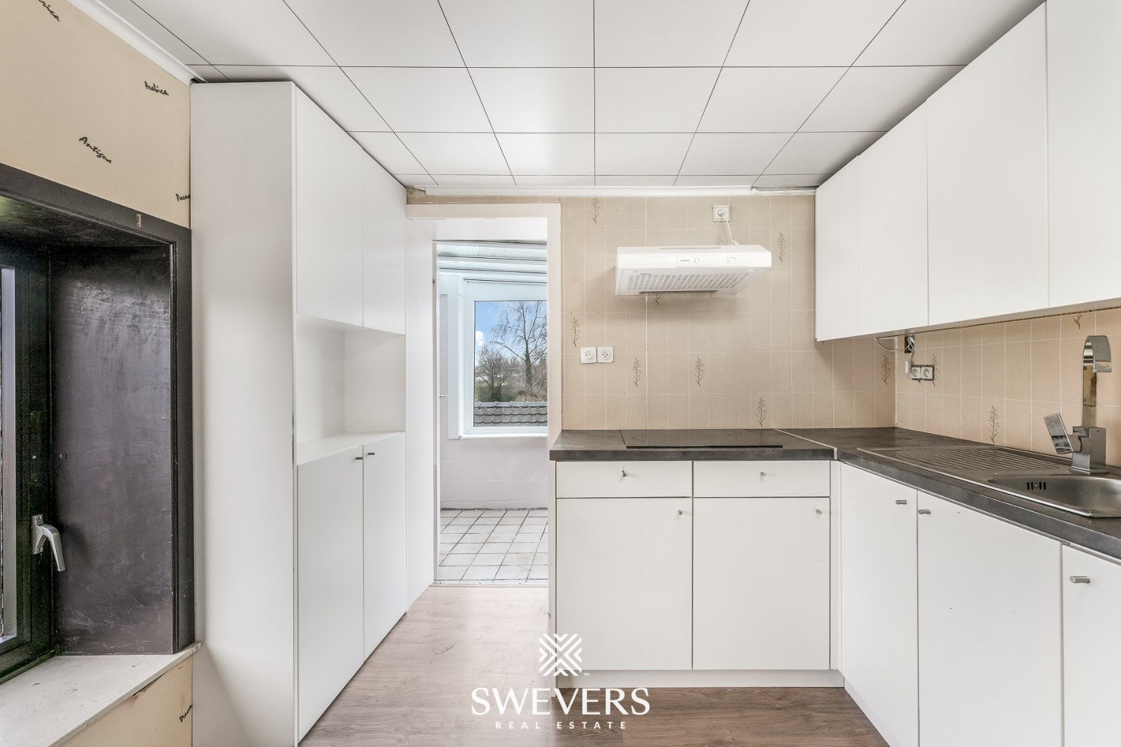 Instapklare woning met handelszaak en appartement in Geetbets foto 29