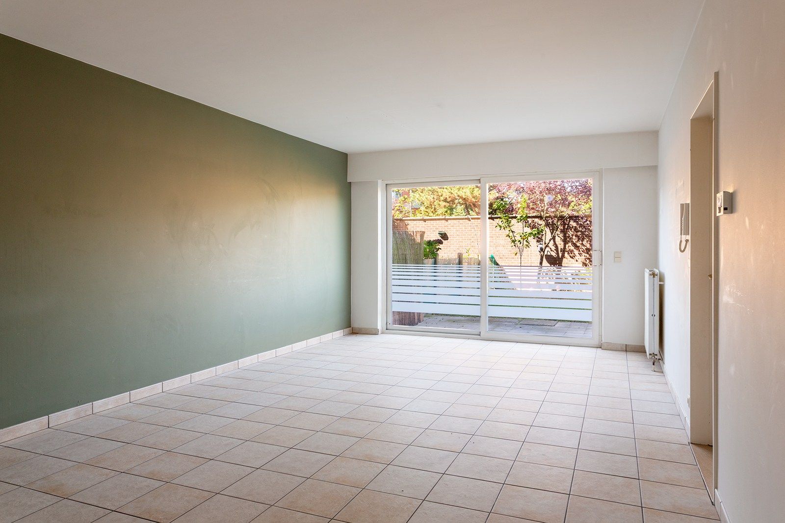 Mooi gelijkvloers appartement met tuin foto 3
