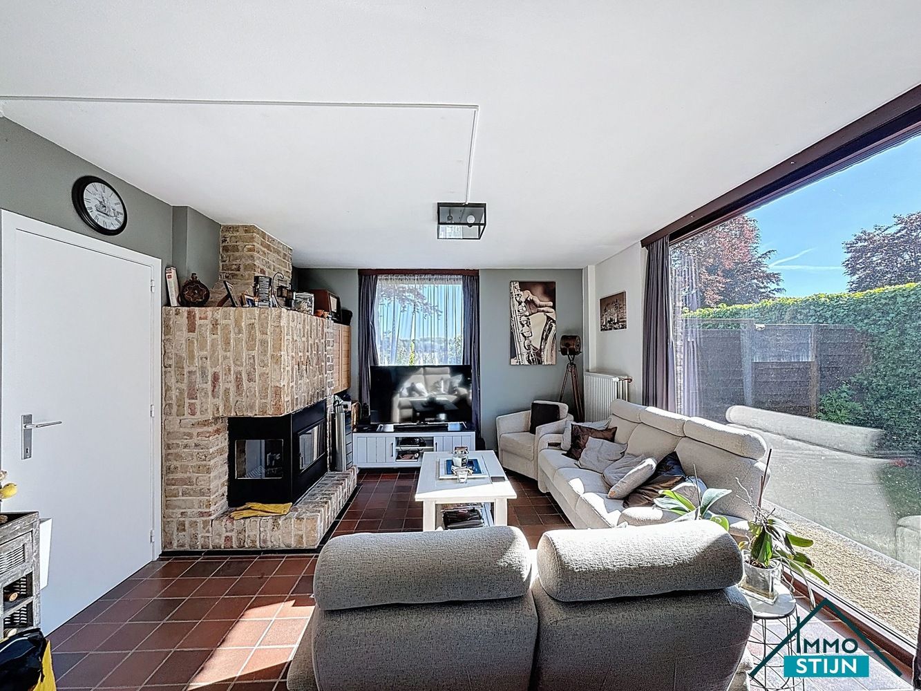 Woning met zongerichte tuin foto 4