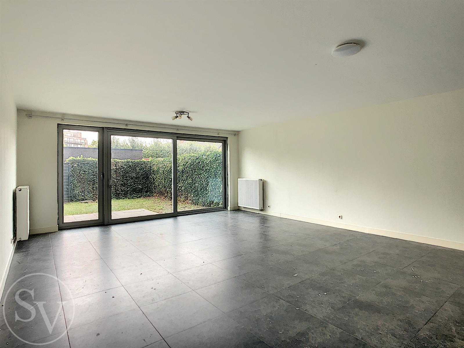 Gelijkvloers appartement, 2 slpk en tuin! foto 3