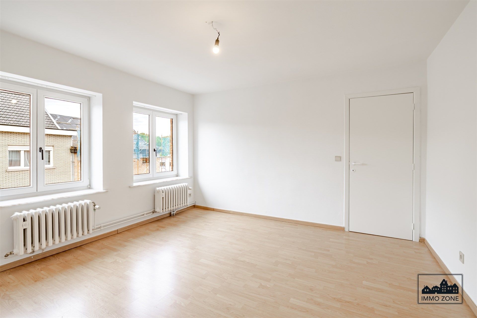 Lichtrijke halfopen woning te Nieuwerkerken! foto 12