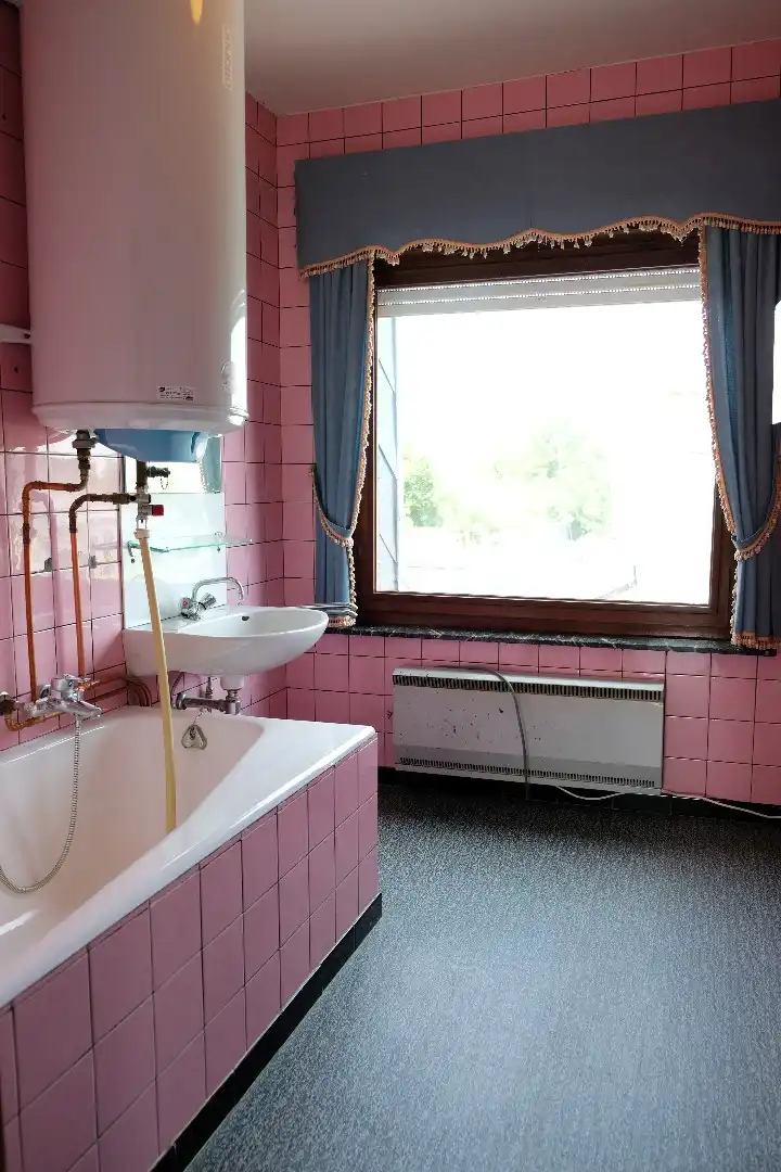 Ruime woning met garage, bijgebouwen en tuin en veel potentieel voor extra slaapkamers foto 16