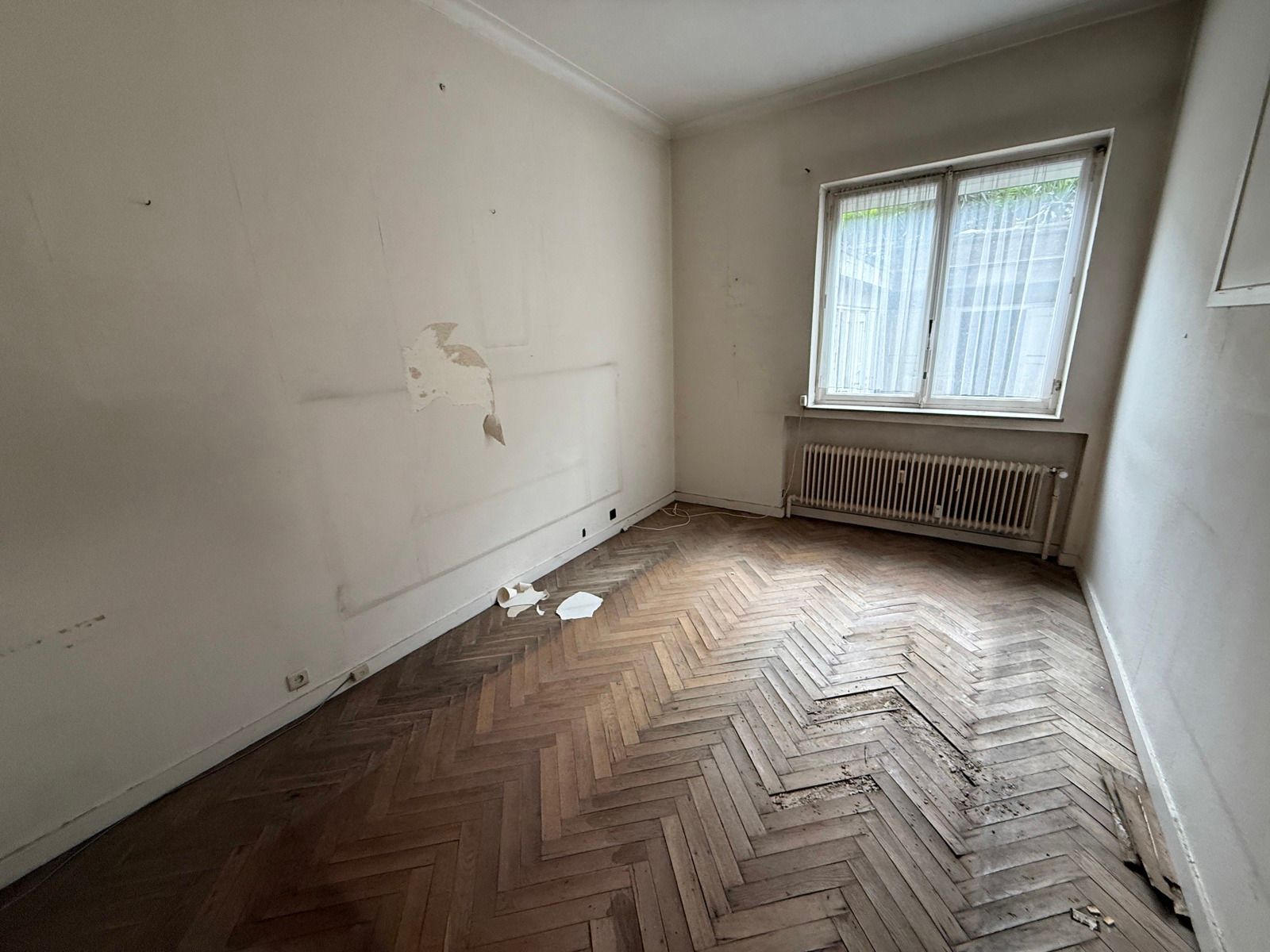 Te renoveren gelijkvloers appartement met 2 slaapkamers foto 6