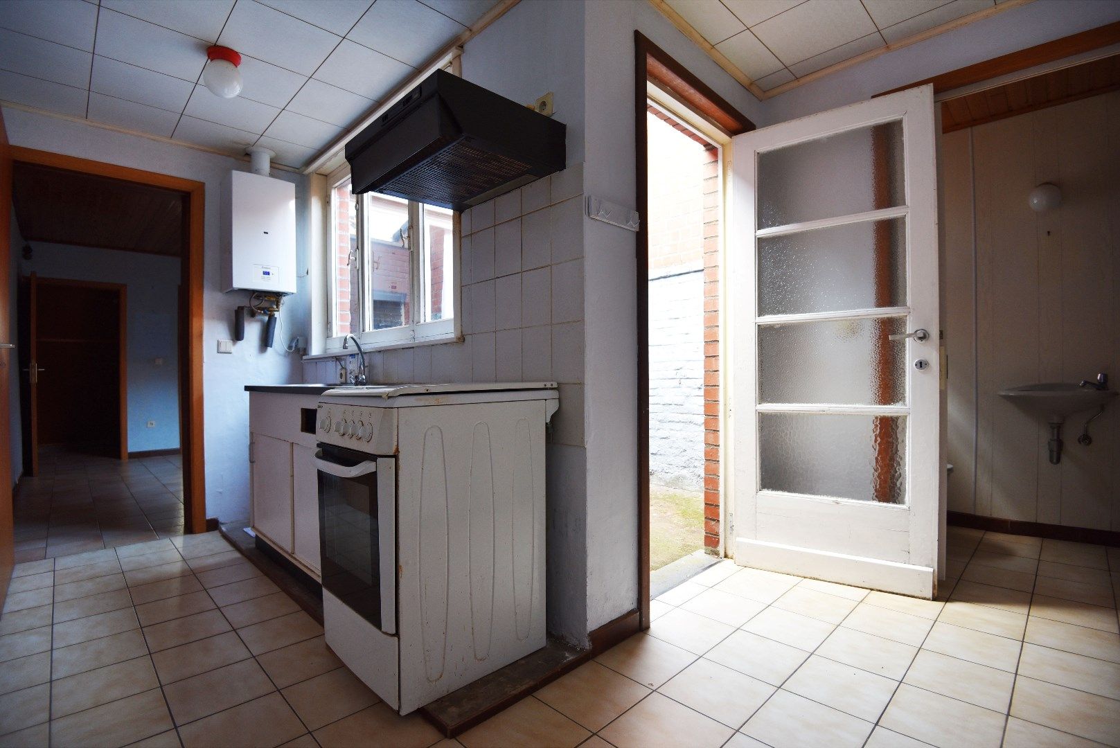 Charmante te renoveren woning  mooi gelegen te centrum Eeklo foto 3