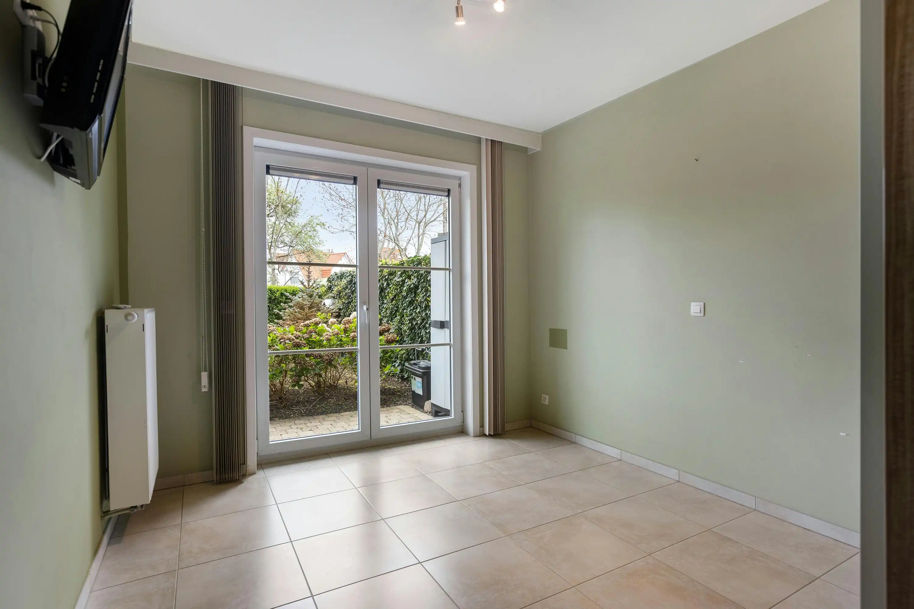 Gelijkvloers appartement (110m²) met tuin op topligging! foto 13