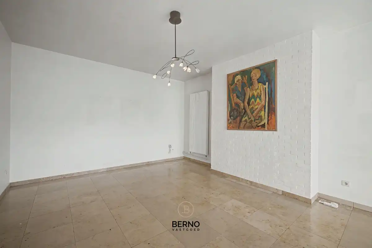 Rijwoning met ruime garage en zongerichte tuin. foto 9