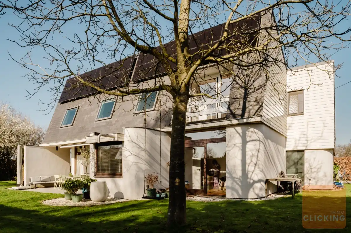 Exclusieve architectenvilla op een uitzonderlijke ligging in Wemmel foto {{pictureIndex}}