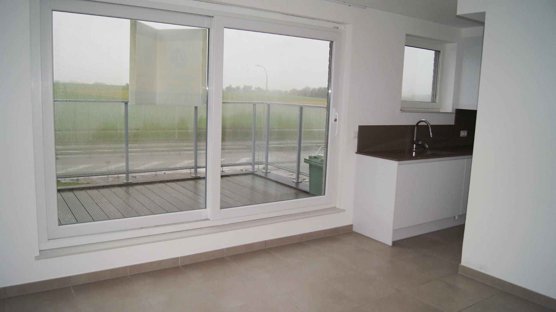 App. met 1 slpk, groot terras en garage foto 7