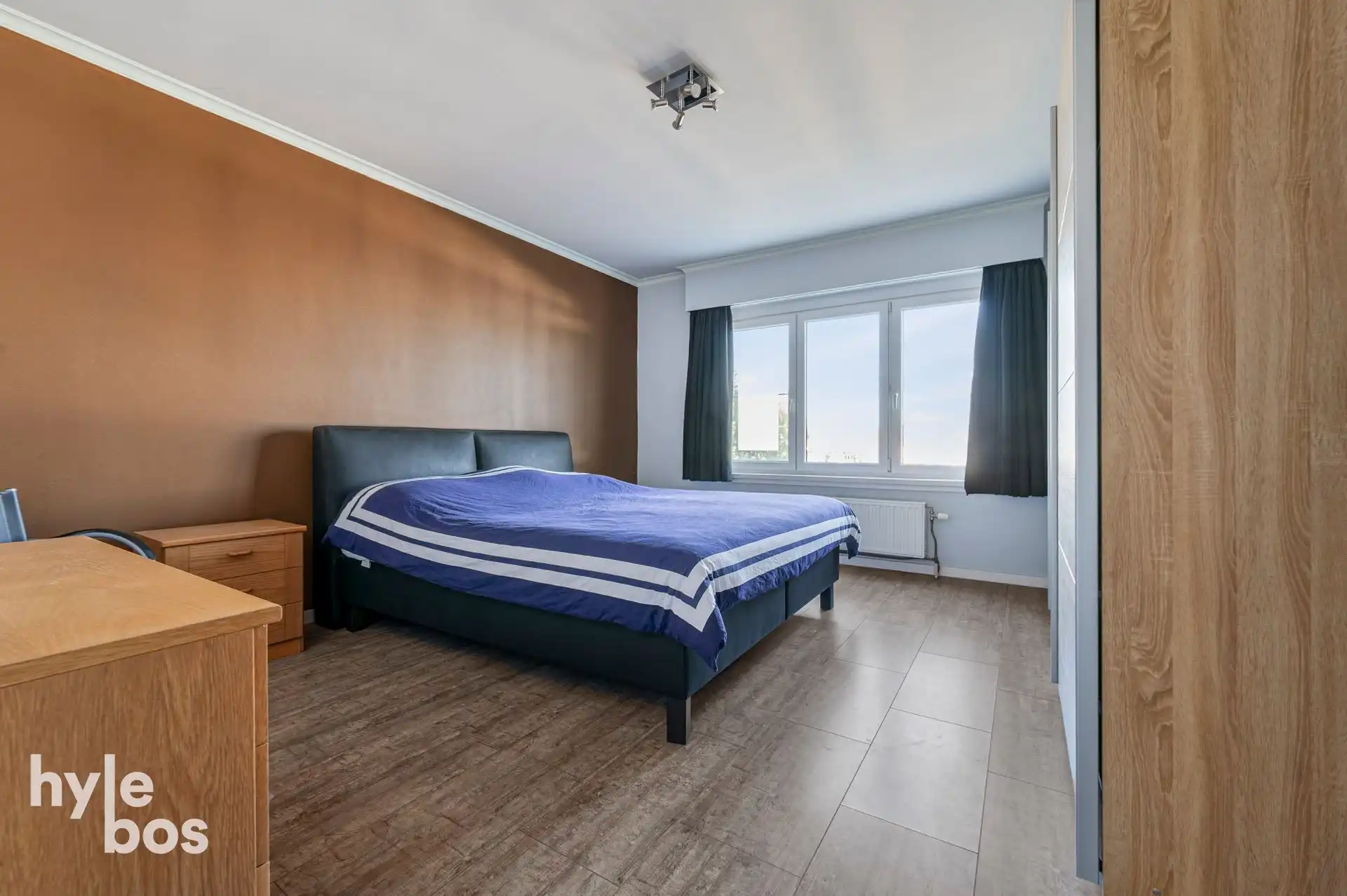Ruim lichtrijk hoekappartement met garage foto 13