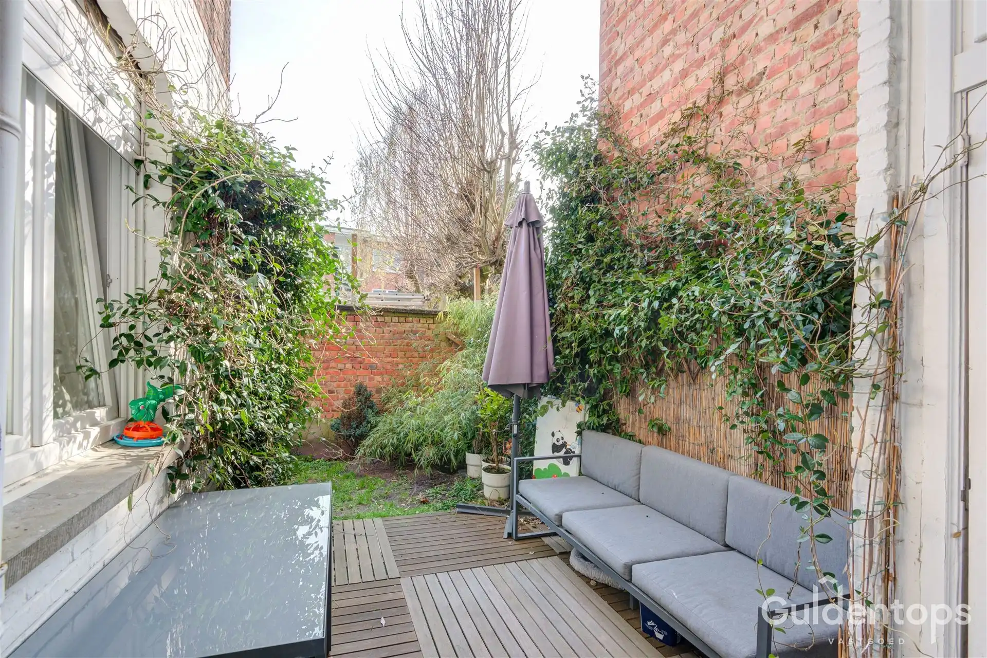 zeer goed gelegen ruim 2 slaapkamerappartement mét tuin foto 15