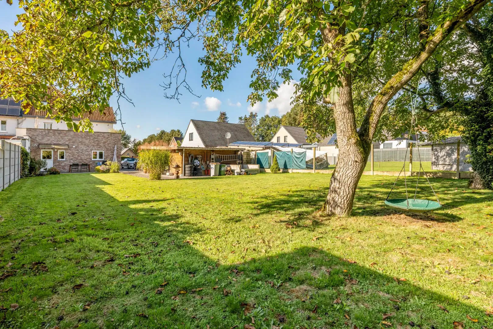 Comfortabel, gelijkvloers appartement mét ruime tuin en carport! foto 13