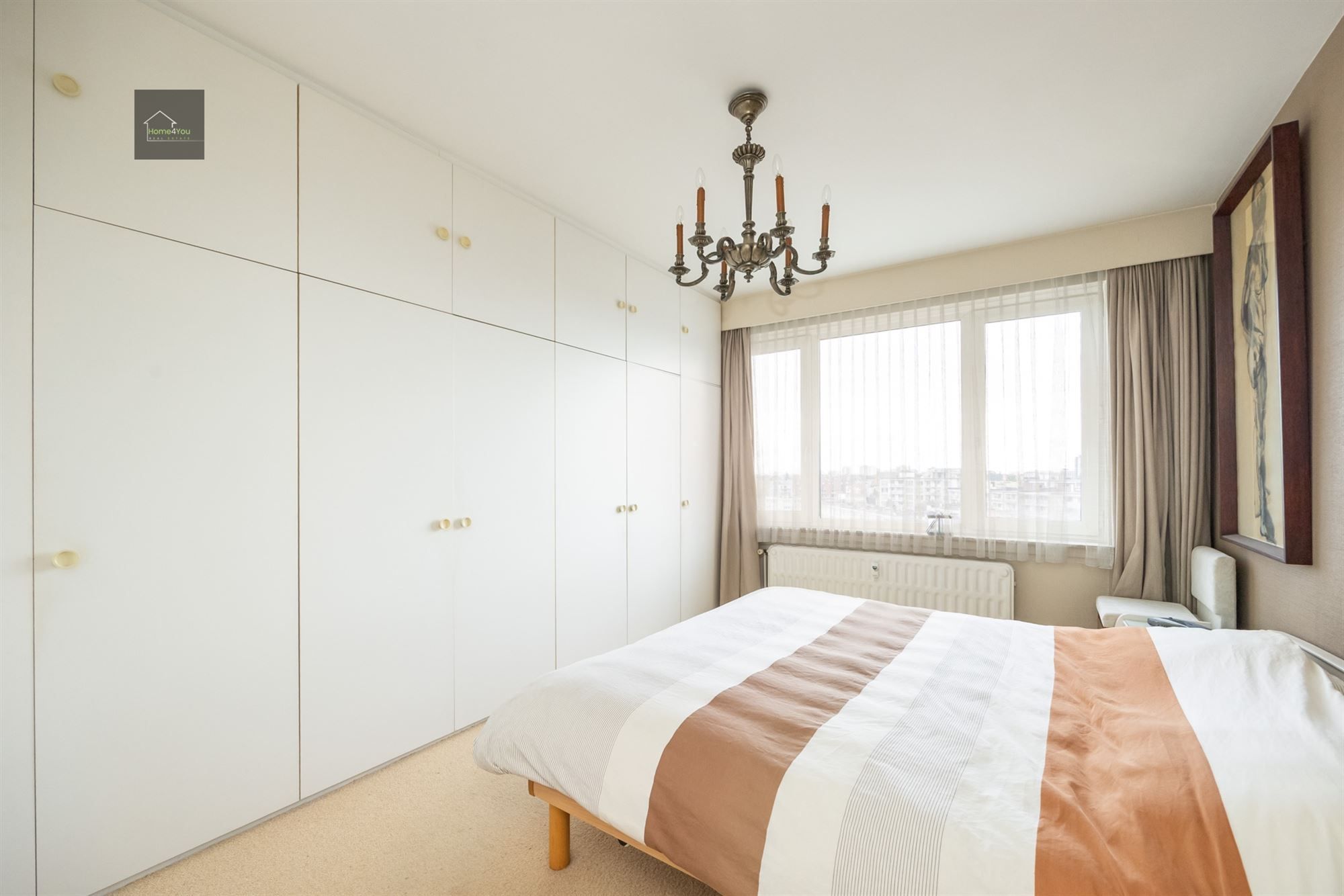 Licht en ruim appartement met uitzicht op het Rivierenhof foto 4