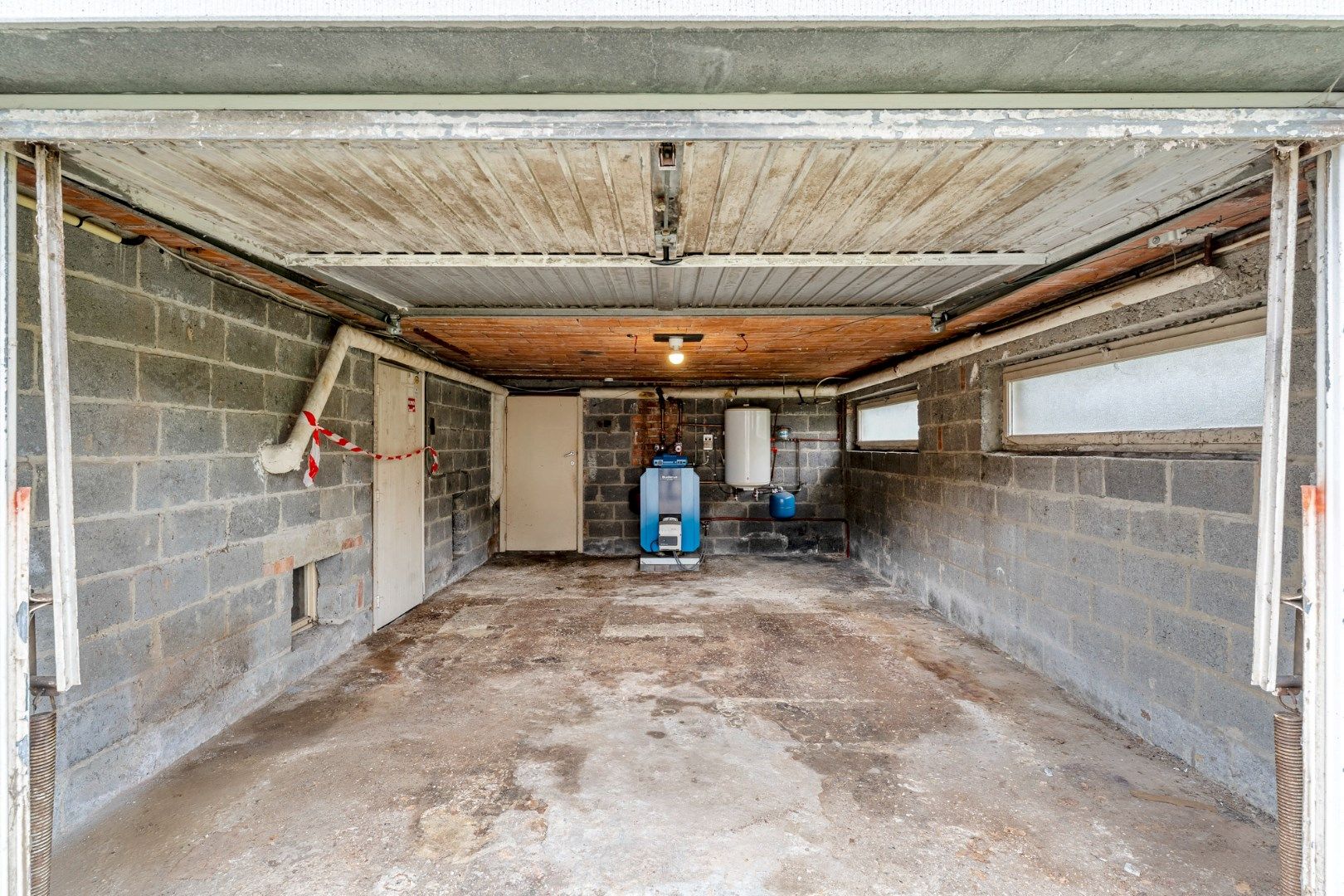 Te renoveren vrijstaande woning op een gunstig gelegen perceel van 12a 07ca vlakbij het centrum foto 17