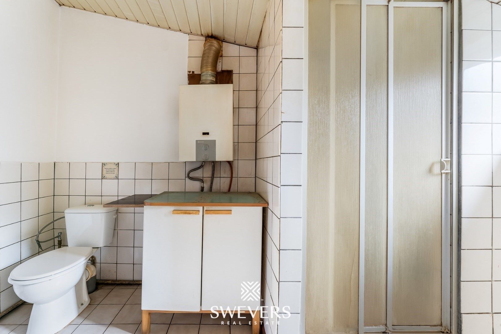 Charmante halfopen woning met renovatiepotentieel in Sint-Truiden foto 16