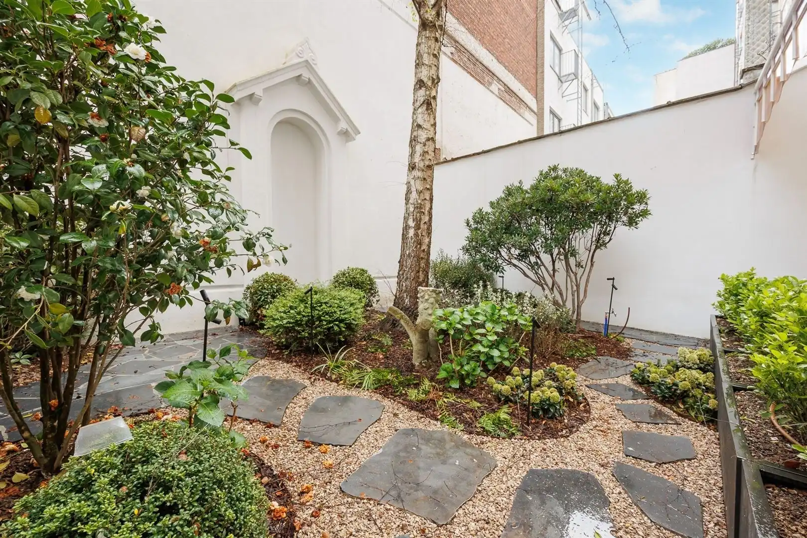 Prachtig afgewerkt appartement met tuin foto 21