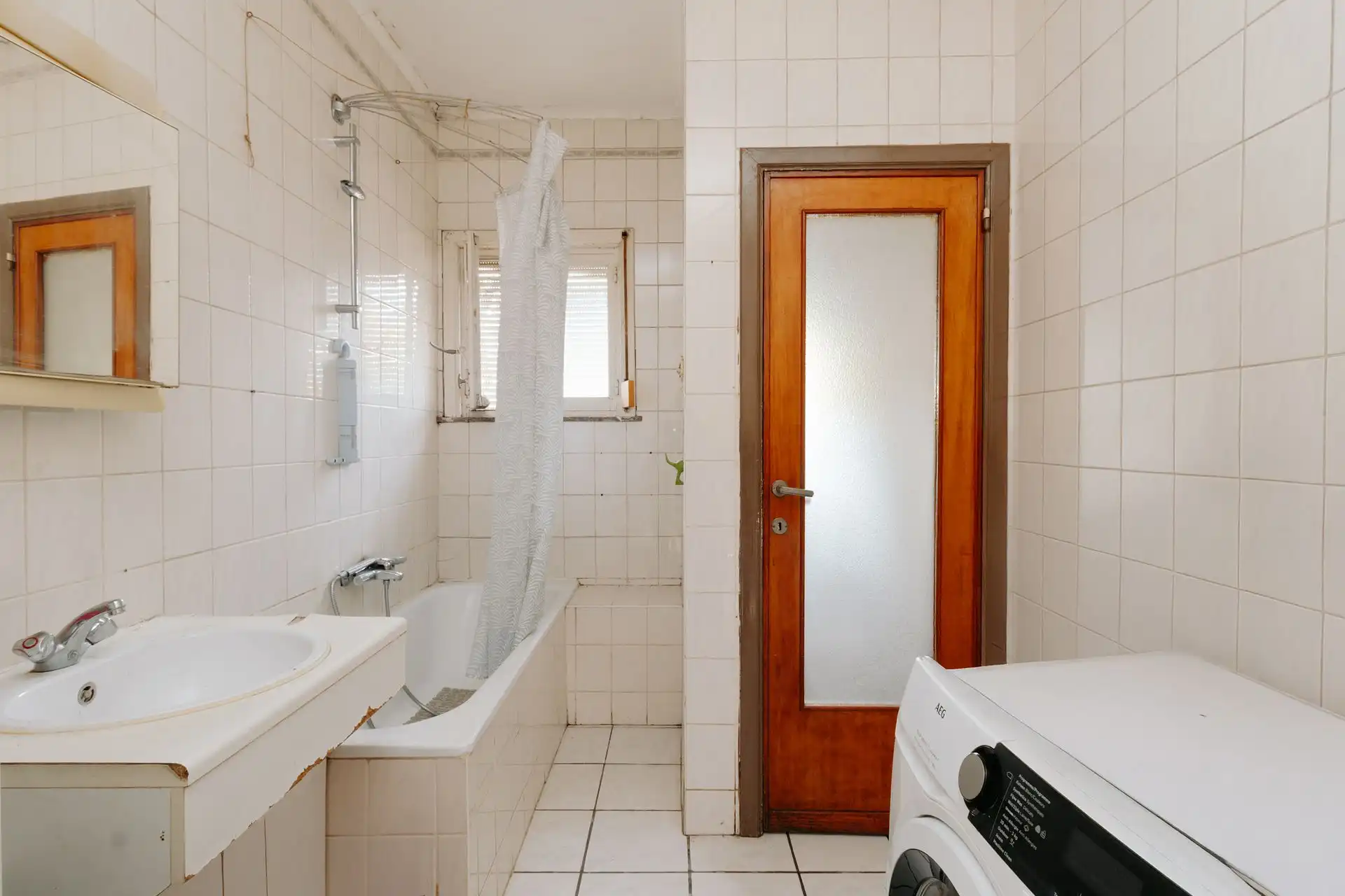 Te renoveren woning met karakter en potentieel in Wilrijk foto 7