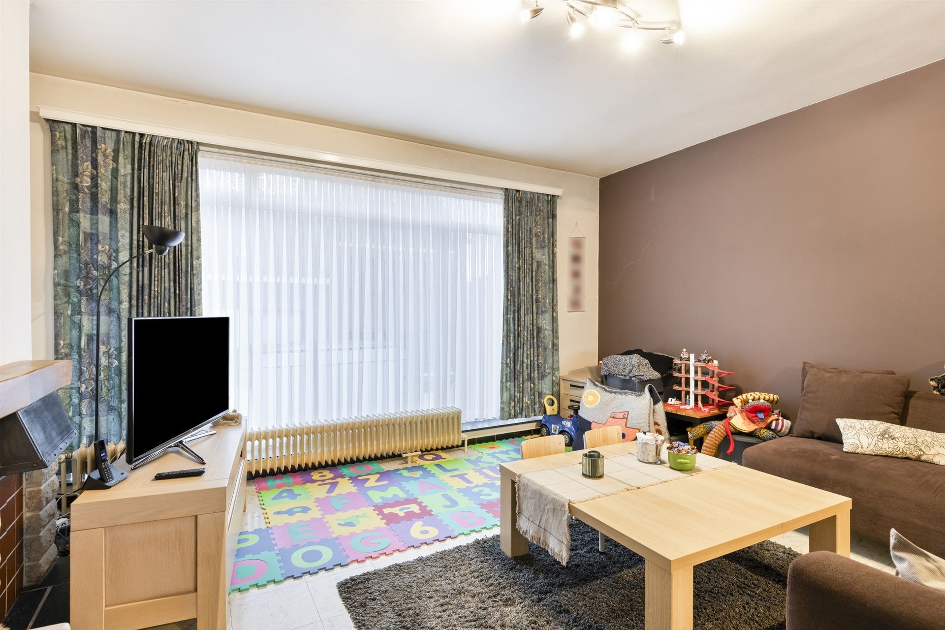 Ruime woning met 4 kamers, groot terras en uitzonderlijke garage! foto 4